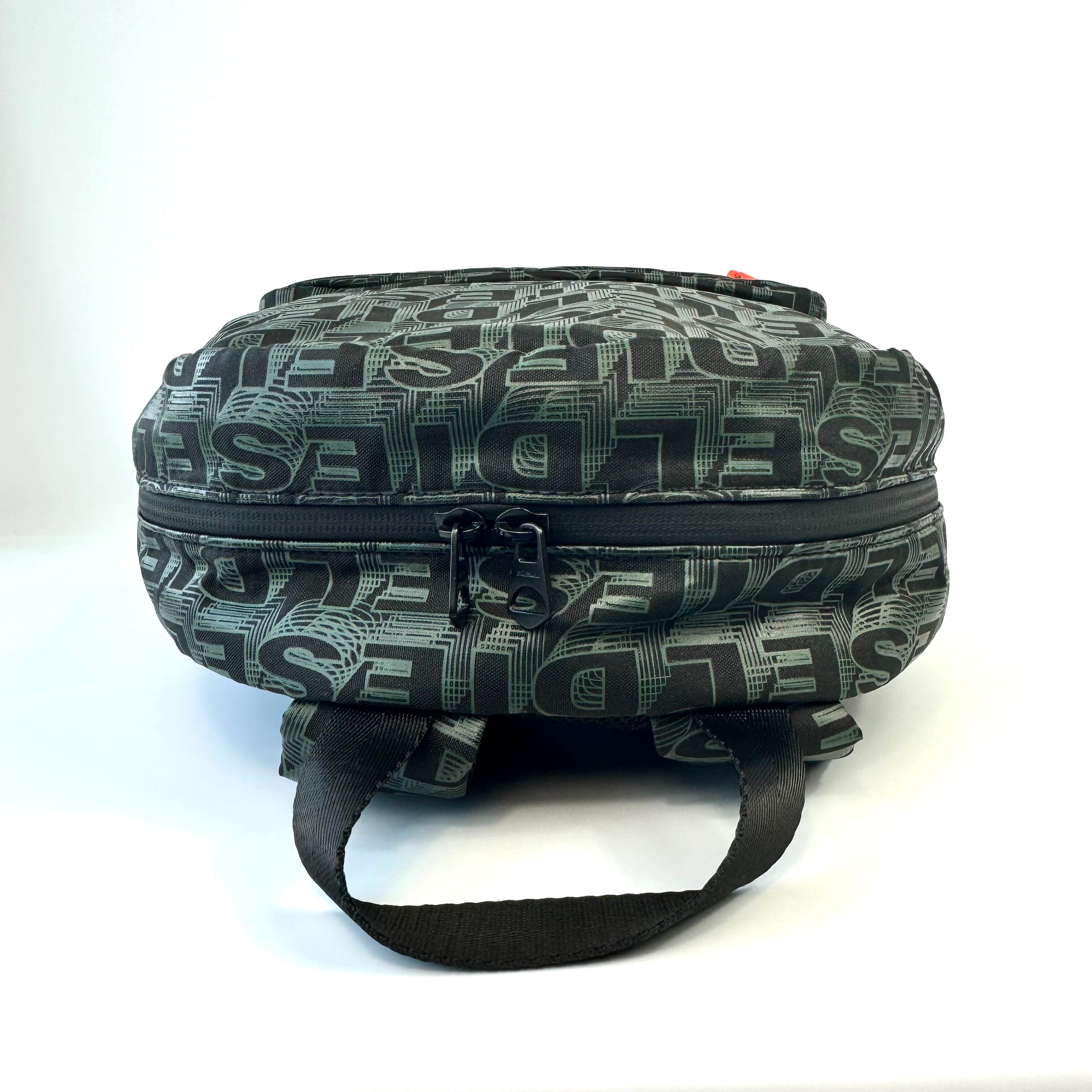 【美品】ディーゼル リュック バックパック モノグラム ロゴ カーキー ネオンオレンジ 緑